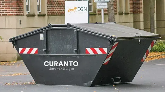 Abfallcontainer Curanto vor dem EGN Werksgelände